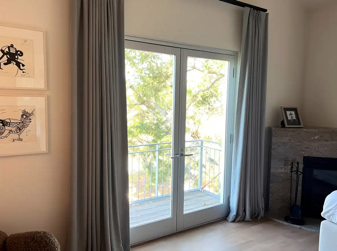 Drapery installed across a residential patio door