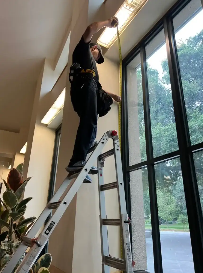 Alro installer completing a commercial window covering installation